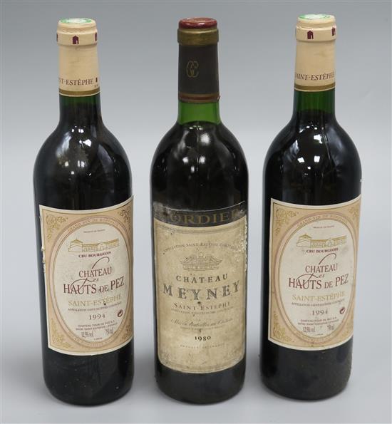A bottle of Chateau Meyney, St. Estephe, 1980 and two bottles of Chateau Haut des Pez, St. Estephe, 1994